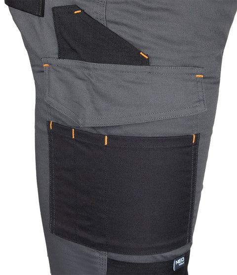 Munkásnadrág Mix&Match Canvas, 280g/m2, 64% poliészter, 34% pamut, 2% elasztán, külső zsebekkel, Cordura megerősítéssel, névtábla tartóval, fényvisszaverő betétekkel, szürke-fekete, több méretben